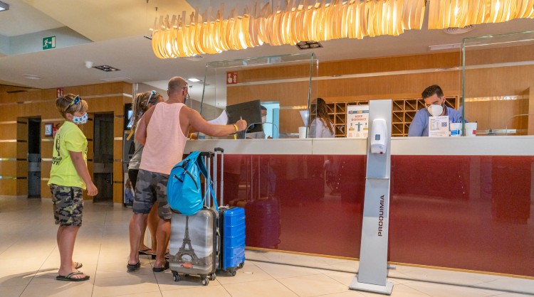 Tourists at accommodation reception in the Canary Islands 