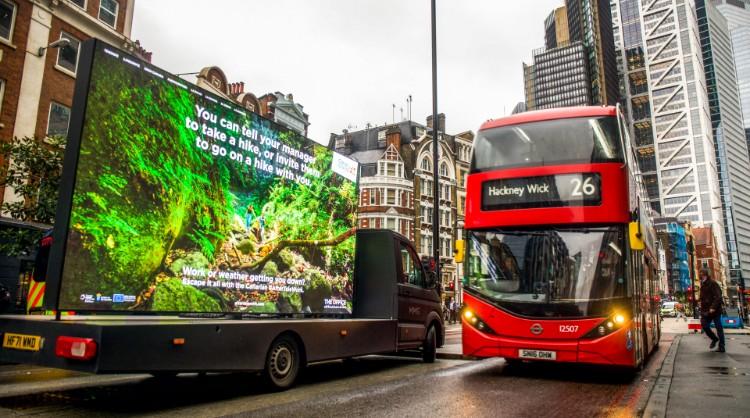 Large screen showcasing the Canary Islands on its strategic journey through London streets 
