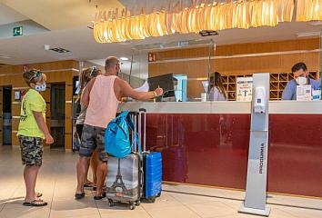 Tourists at accommodation reception in the Canary Islands 