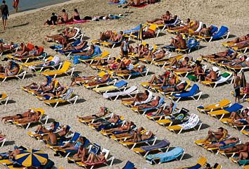 Turistas en la playa, Islas Canarias