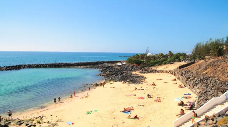 Tourists on a beach in the Canary Islands